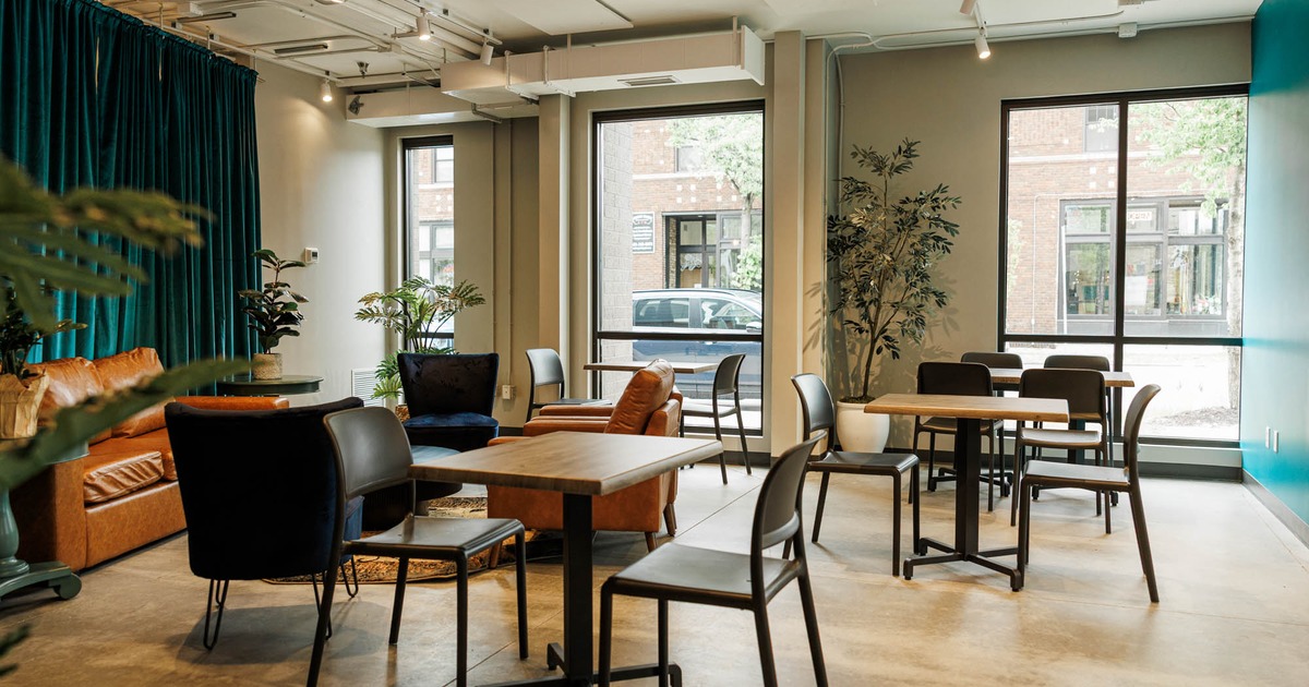 Interior, seating area, tables and chairs, lounge seating on the left