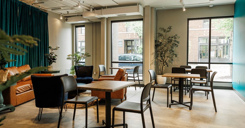 Interior, seating area, tables and chairs, lounge seating on the left