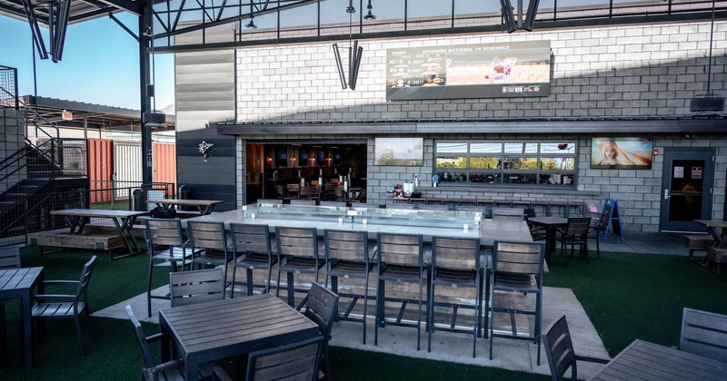 Tall table and bar stools, exterior area