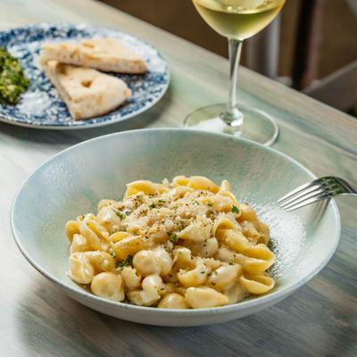 Conchiglie ai Quattro Formaggi - Shells in 4 Cheeses: Fontina, Gruyere, Mozzarella, Parmigiana.