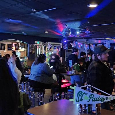 Crowd of people inside Draft Choice Sports Bar and Grill.