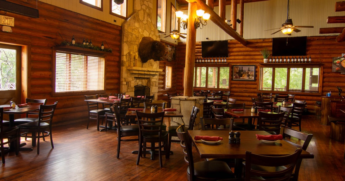 Interior, wide view of dining area, tables and chairs