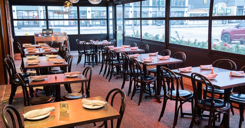 Interior, dining area, tables ready for guests