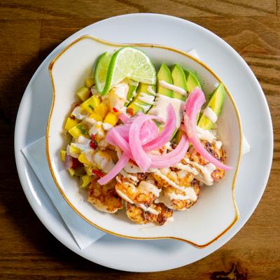 Shrimp bowl  with avocado and mango salsa.