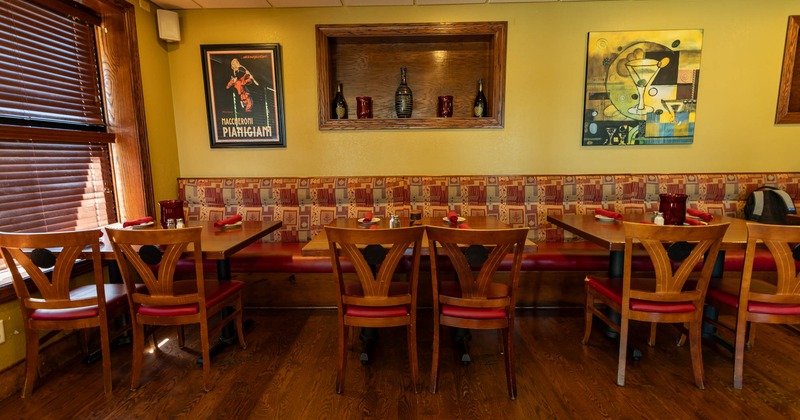 Interior, tables, chairs and banquette seating