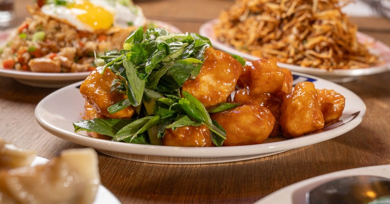 Crispy tofu with miso caramel glaze, and herb salad