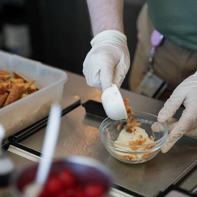 ice cream cone chips on vanilla ice cream.