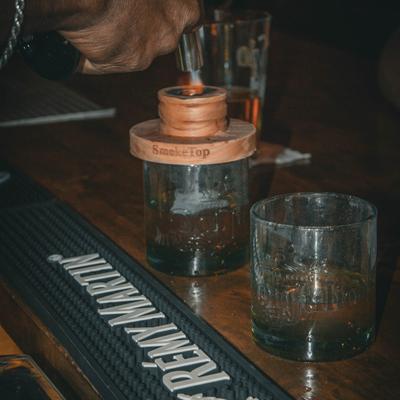 Bartender preparing a cocktail.