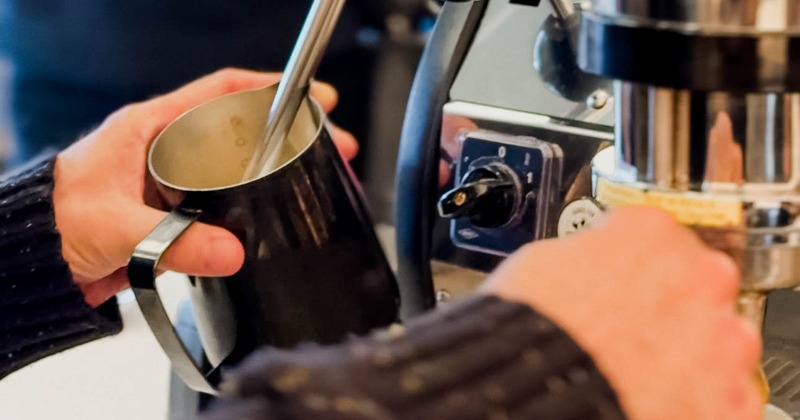 Employee making coffee