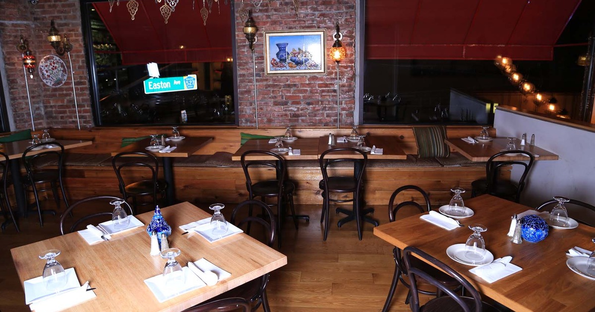 Cozy interior dining area with set tables