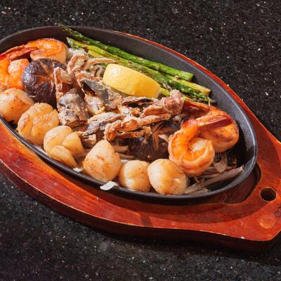 A sizzling plate of seafood hibachi.