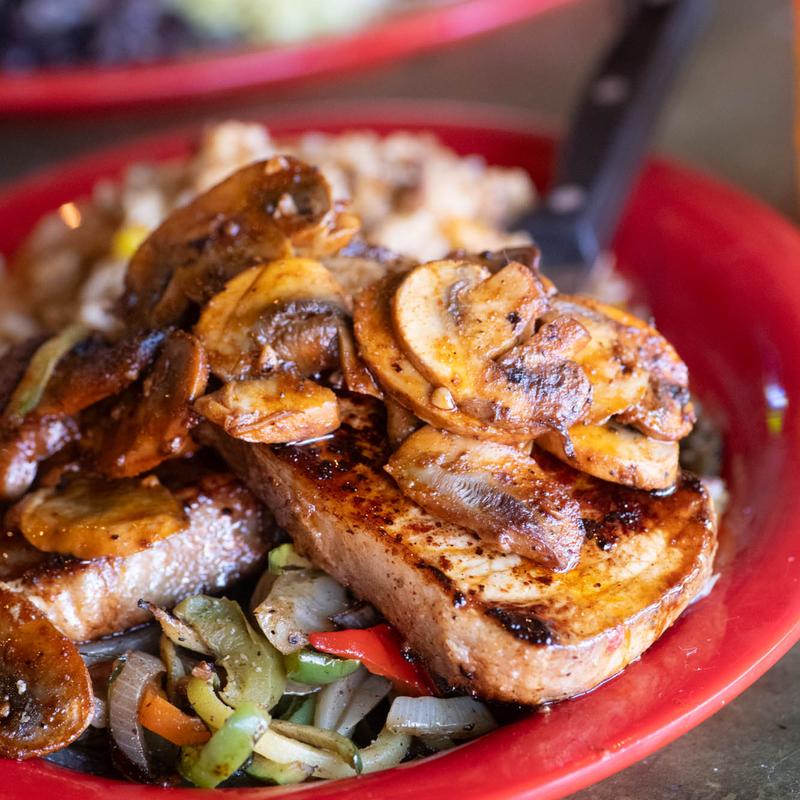 menu item 10 of 15, House Cut Smothered Boneless Pork Chops