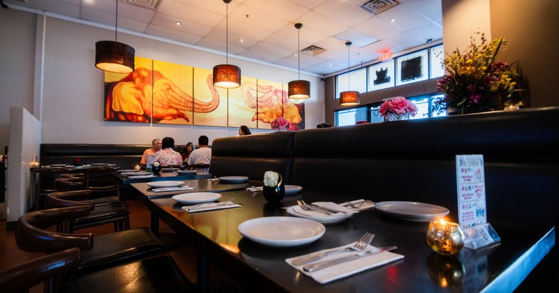 Interior, dining area with chairs, tables and leather benches