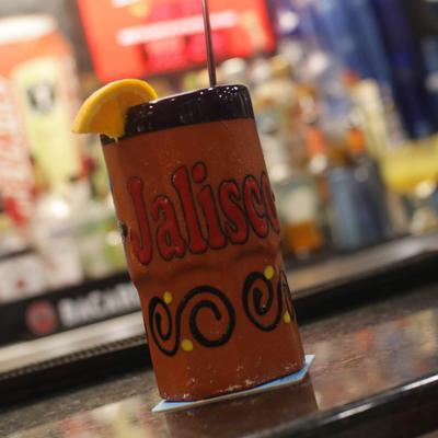 Raymond specialty drink on a bar counter.