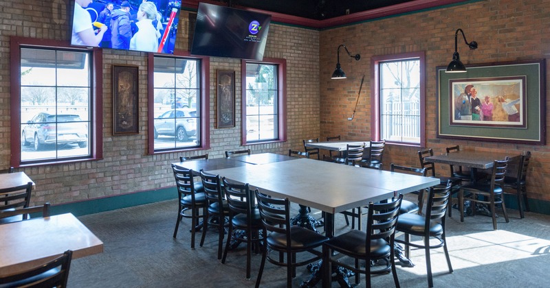 Cozy interior seating area with a large table in the center