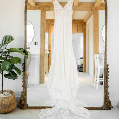 A lustrous wedding dress on display.