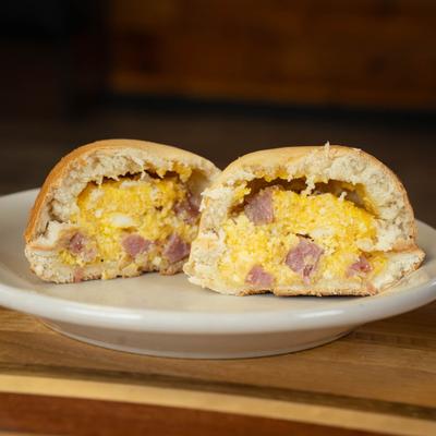 Pastry filled with scrambled eggs and ham.