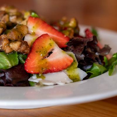 Mista Salad, with mixed greens, strawberries, candied walnuts, goat cheese and vinaigrette