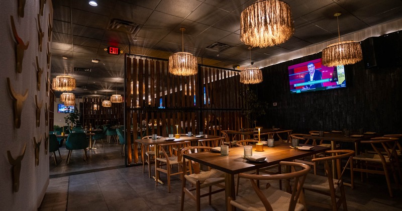 Interior, seating area with big TV on the wall