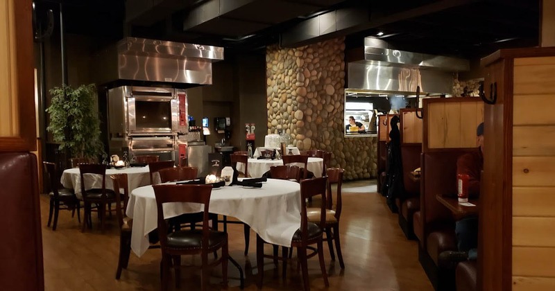 Interior, set tables and chairs ready for guests