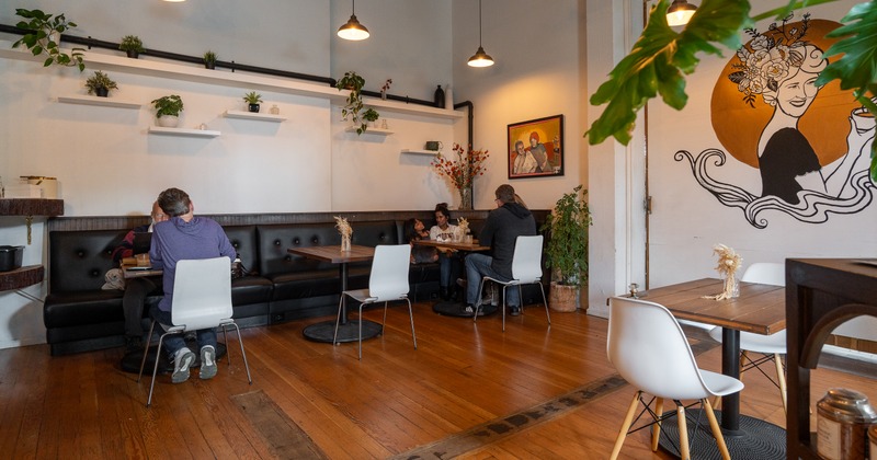 Interior, booths, tables, chairs, people