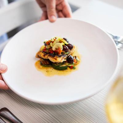 Grilled Snapper, with roasted zucchini, peppers, olive, and celery relish