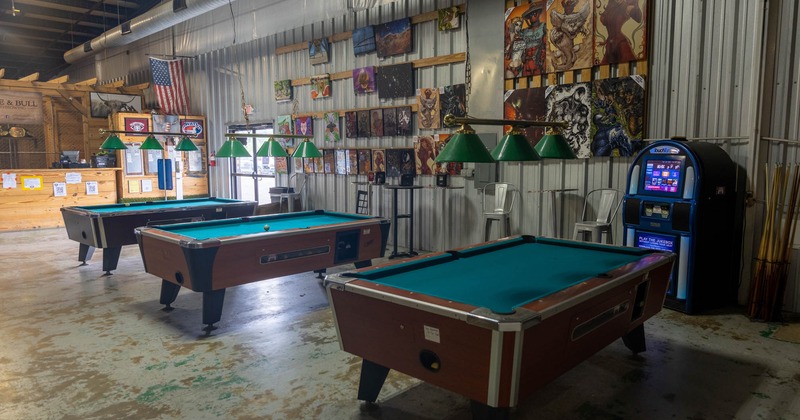 Interior, pool tables lined up