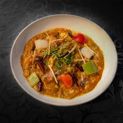 A vibrant north Indian curry with cottage cheese, bell peppers and masala.