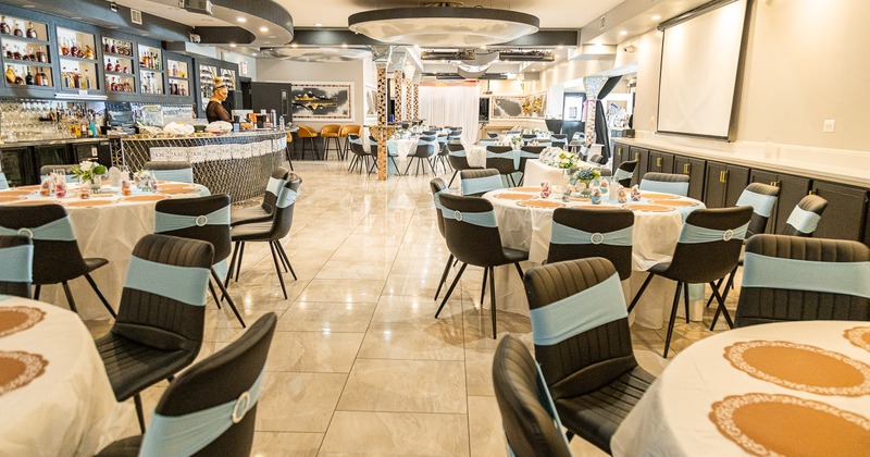 A luxurious and spacious banquet hall with modern and elegant design