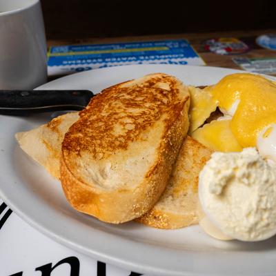 Ravioli Benedict, with garlic hollandaise, and toast.