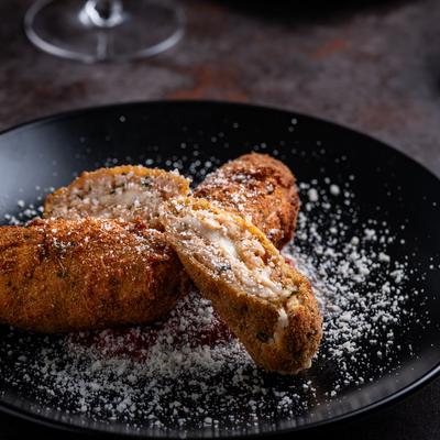 Mozzarella and tomato sauce rice snacks.