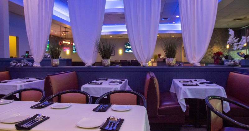 Interior, seating area with tables and booths