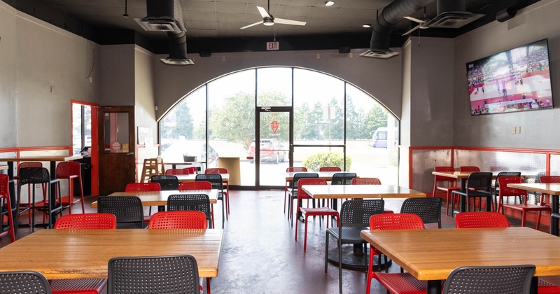 Interior, seating area with tables and chairs