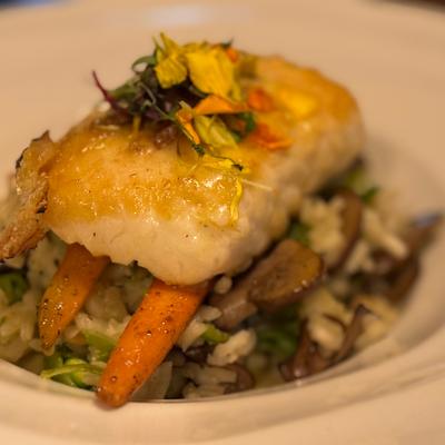 Halibut with mushroom risotto & citrus beurre blanc.