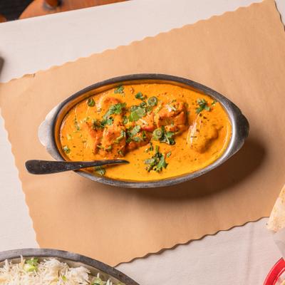 Chicken tikka masala in a metal dish.