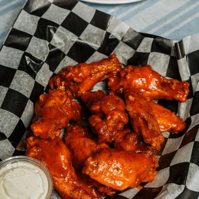 Traditional wings served with dipping sauce.
