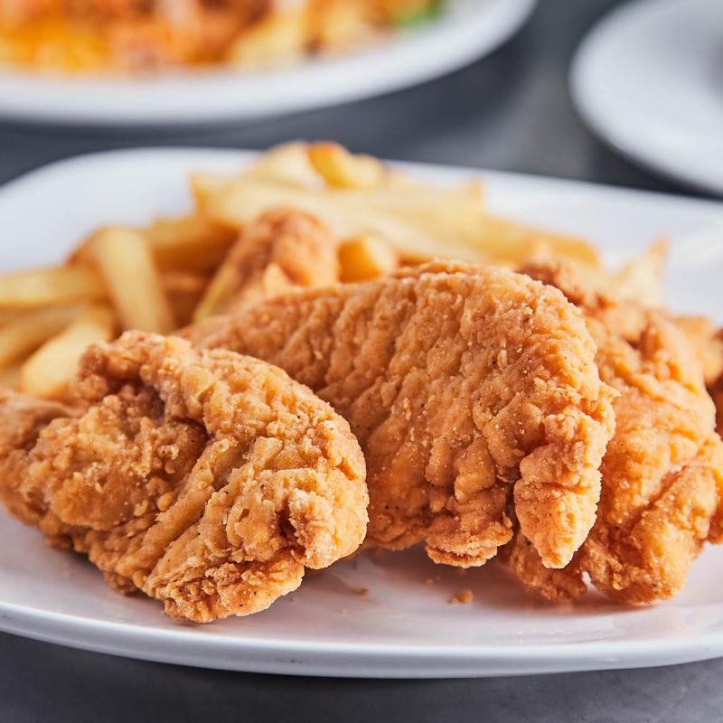 Chicken Fingers With French Fries photo