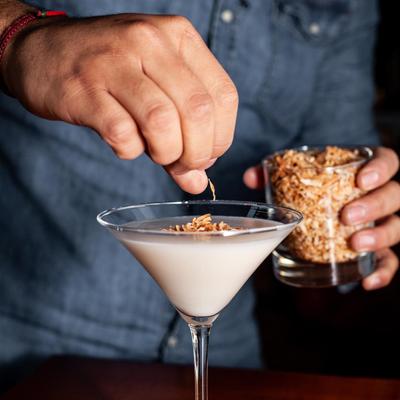 White cocktail with nuts