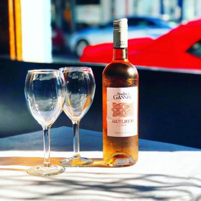 Bottle of wine and two  wine glasses