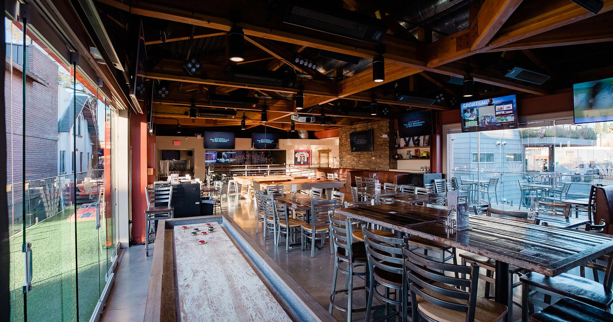 Tables lined up, ready for guests