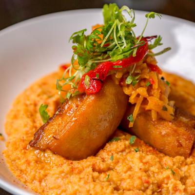 Braised pork belly, served with garbanzo puree and apple chutney.