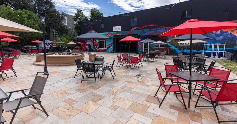 Exterior, patio, wide view, tables and chairs, parasols