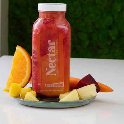 Carrot, beet, apple, lemon, and ginger juice.