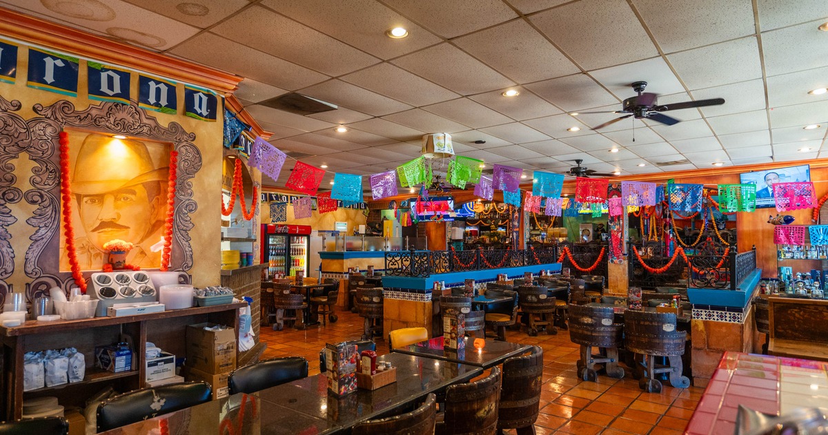 Interior of a colorful Mexican restaurant with festive decorations
