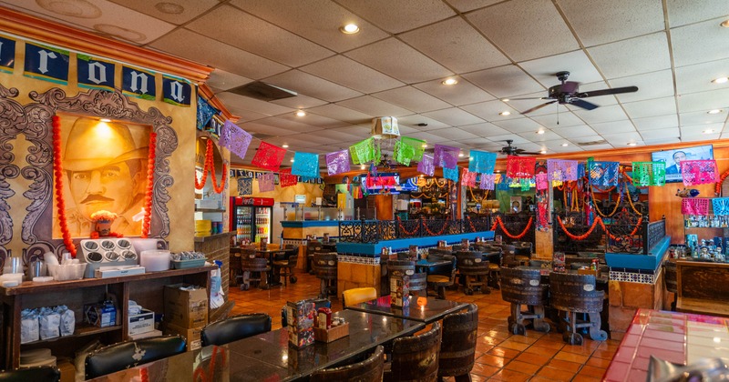 Interior of a colorful Mexican restaurant with festive decorations