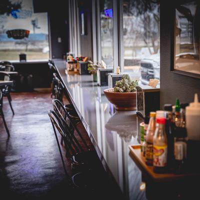 Interior, chairs and a dining counter.