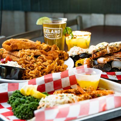 A variety of seafood platters on  a table.