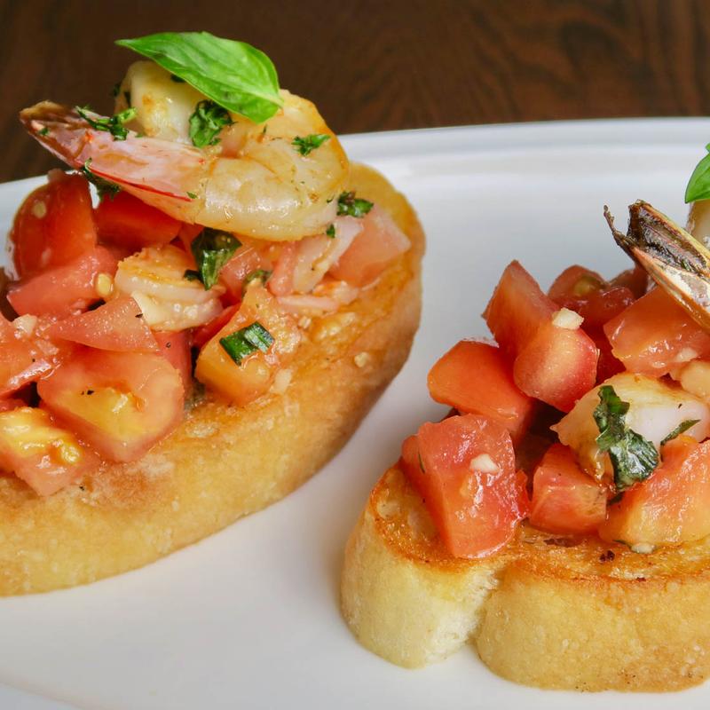 Bruschetta con Scampi e Pomdori photo