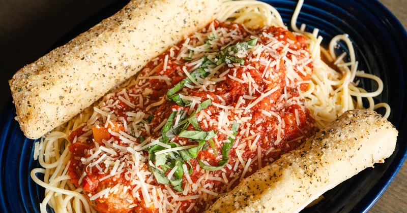 Spaghetti and meatballs with mozzarella sticks