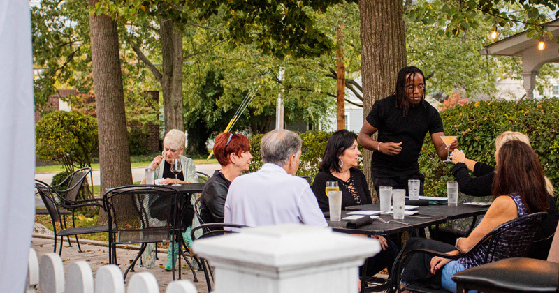 Exterior patio with guests seated outside